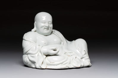 A Chinese famille rose Milefo Buddha and a white-glazed Milefo Buddha, 19th C.