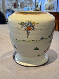 A Chinese famille rose 'riders on horseback' vase and a wooden cover, Yongzheng/Qianlong