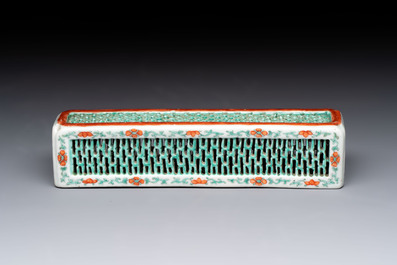 A Chinese iron-red and green-enamelled reticulated incense stick holder, 19th C.