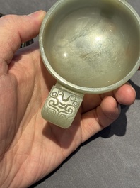 A Chinese white jade bowl with ruyi-shaped handles, wooden cover and stand, 18/19th C.