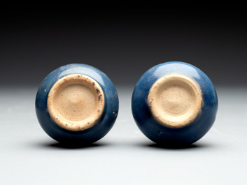 A pair of Chinese powder-blue vases and a blue and white 'Hatcher Cargo' vase, Transitional period