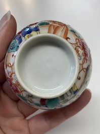 Eight Chinese Canton famille rose cups, 14 saucers and a teapot, Qianlong