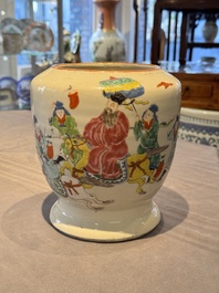 A Chinese famille rose 'riders on horseback' vase and a wooden cover, Yongzheng/Qianlong
