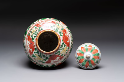 A Chinese wucai jar and cover, a famille verte vase, a dish and three plates, Kangxi