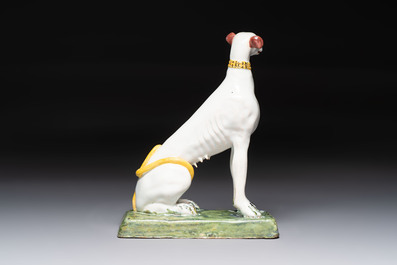 A polychrome Brussels faience greyhound, 18th C.