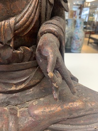 A Chinese gilt-lacquered wooden sculpture of Buddha, 18/19th C.