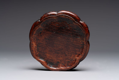 A pair of Chinese polychrome 'persimmons' groups on wooden stands, 19th C.