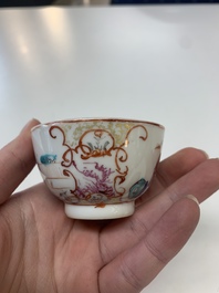 Eight Chinese Canton famille rose cups, 14 saucers and a teapot, Qianlong