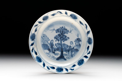 A Chinese blue and white 'Sense of Smell' plate and an 'Amorous Shepherds' plate, Kangxi