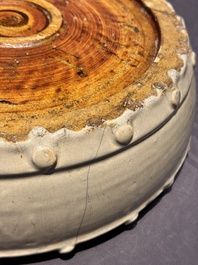 A large Chinese cream-glazed drum-shaped basin, Ming