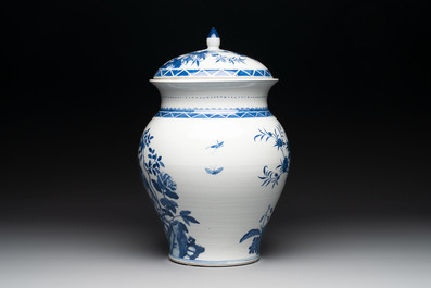 A Chinese blue and white 'birds among flowering branches' vase and cover, 19th C.