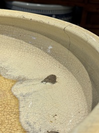 A large Chinese cream-glazed drum-shaped basin, Ming