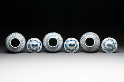 A Chinese blue and white garniture of five vases with landscape design, 19th C.