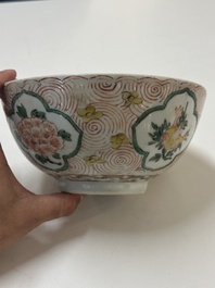 A Chinese wucai 'pomegranate, peony and rabbit' bowl, Transitional period