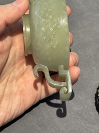 A Chinese white jade bowl with ruyi-shaped handles, wooden cover and stand, 18/19th C.