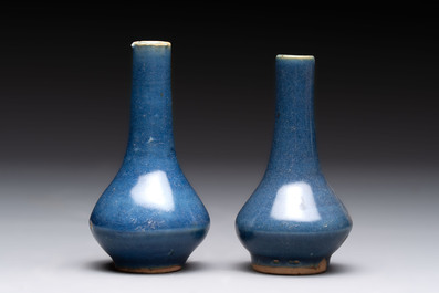A pair of Chinese powder-blue vases and a blue and white 'Hatcher Cargo' vase, Transitional period
