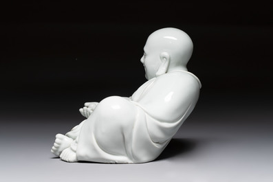 A Chinese famille rose Milefo Buddha and a white-glazed Milefo Buddha, 19th C.