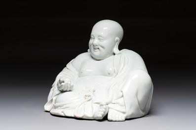 A Chinese famille rose Milefo Buddha and a white-glazed Milefo Buddha, 19th C.