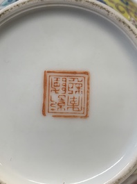 A pair of Chinese famille rose covered vases and a plate, Kangxi and Qianlong mark, 20th C.