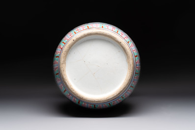A Chinese famille rose yellow-ground covered bowl, a famille rose vase and a turquoise-ground vase, 19th C.