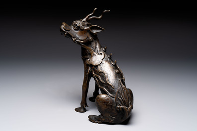A fine Chinese bronze incense holder in the form of a qilin, Ming