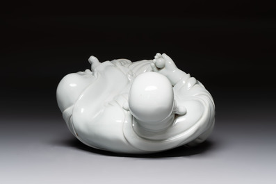 A Chinese famille rose Milefo Buddha and a white-glazed Milefo Buddha, 19th C.