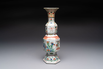 A Chinese wucai jar and cover, a famille verte vase, a dish and three plates, Kangxi