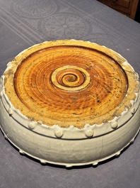 A large Chinese cream-glazed drum-shaped basin, Ming