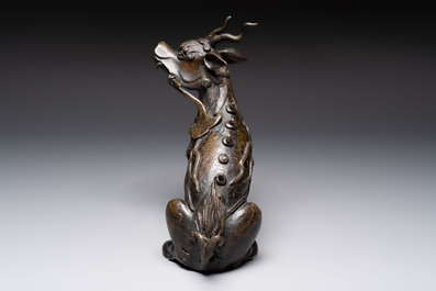 A fine Chinese bronze incense holder in the form of a qilin, Ming