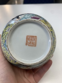A pair of Chinese famille rose covered vases and a plate, Kangxi and Qianlong mark, 20th C.