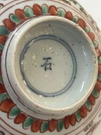 A Chinese wucai 'dragon and phoenix' bowl, Shi 石 mark, Transitional period