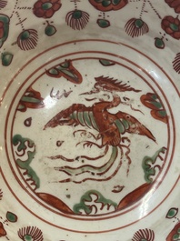 A Chinese wucai 'dragon and phoenix' bowl, Shi 石 mark, Transitional period
