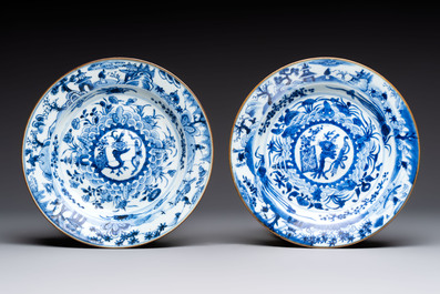 Five Chinese blue and white plates with raised central medallions, Kangxi/Yongzheng
