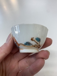 Eight Chinese Canton famille rose cups, 14 saucers and a teapot, Qianlong