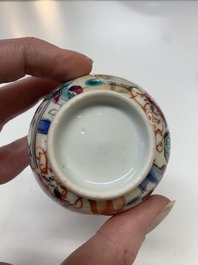 Eight Chinese Canton famille rose cups, 14 saucers and a teapot, Qianlong