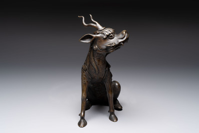 A fine Chinese bronze incense holder in the form of a qilin, Ming