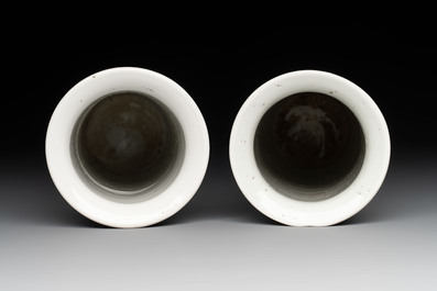 A Chinese blue and white garniture of five vases with landscape design, 19th C.