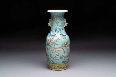 A Chinese famille rose yellow-ground covered bowl, a famille rose vase and a turquoise-ground vase, 19th C.