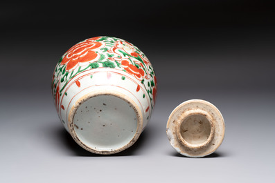 A Chinese wucai jar and cover, a famille verte vase, a dish and three plates, Kangxi