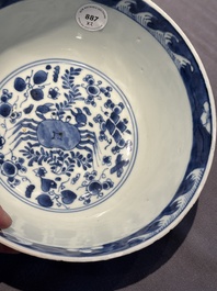A Chinese blue and white 'floral 'bowl and an 'aquatic animals' bowl, Kangxi