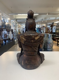 A Chinese gilt-lacquered wooden sculpture of Buddha, 18/19th C.
