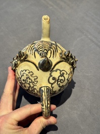 A Chinese Cizhou 'cadogan' ewer with dragons, Yuan/Ming