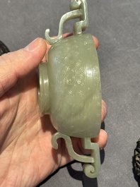 A Chinese white jade bowl with ruyi-shaped handles, wooden cover and stand, 18/19th C.