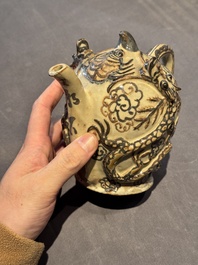 A Chinese Cizhou 'cadogan' ewer with dragons, Yuan/Ming