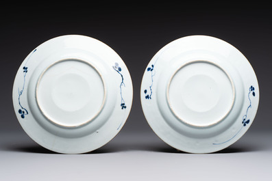 Five Chinese blue and white plates with raised central medallions, Kangxi/Yongzheng