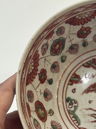 A Chinese wucai 'dragon and phoenix' bowl, Shi 石 mark, Transitional period