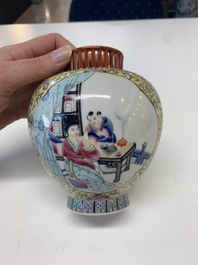 A pair of Chinese famille rose covered vases and a plate, Kangxi and Qianlong mark, 20th C.