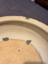 A large Chinese cream-glazed drum-shaped basin, Ming