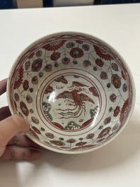 A Chinese wucai 'dragon and phoenix' bowl, Shi 石 mark, Transitional period