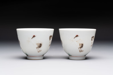 A pair of Chinese famille rose 'crane' cups and a 'dragon' brush pot, Guangxu mark, 20th C.